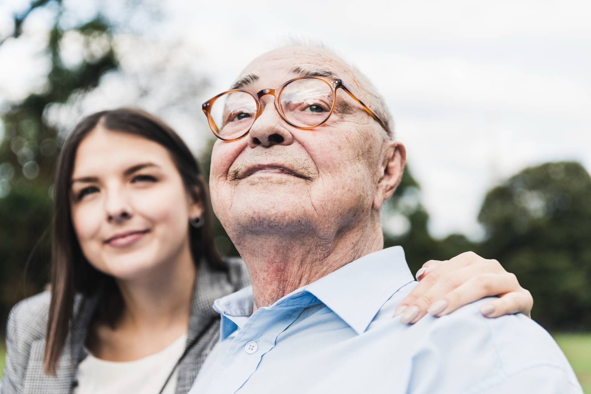 happy senior with grandchild outdoors